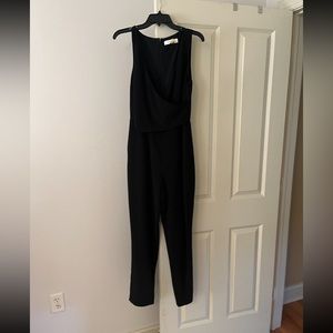 Women’s black sleeveless jumpsuit. Size large.